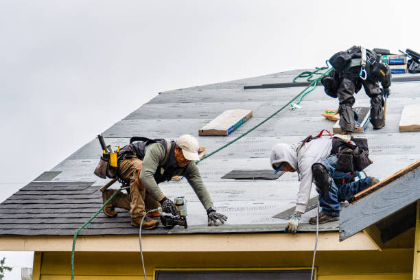 Professional Gutter Installation technician working in Slatersville, RI